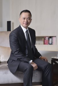 Lo Young in suit